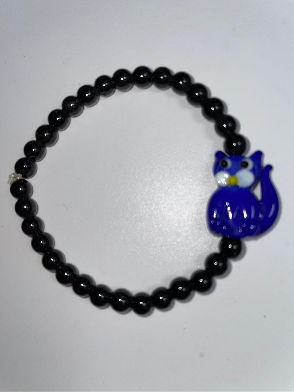 Cottage Core, Black Tourmaline Blue Cat Stretch Bracelet 
Designs by Ch Lovin